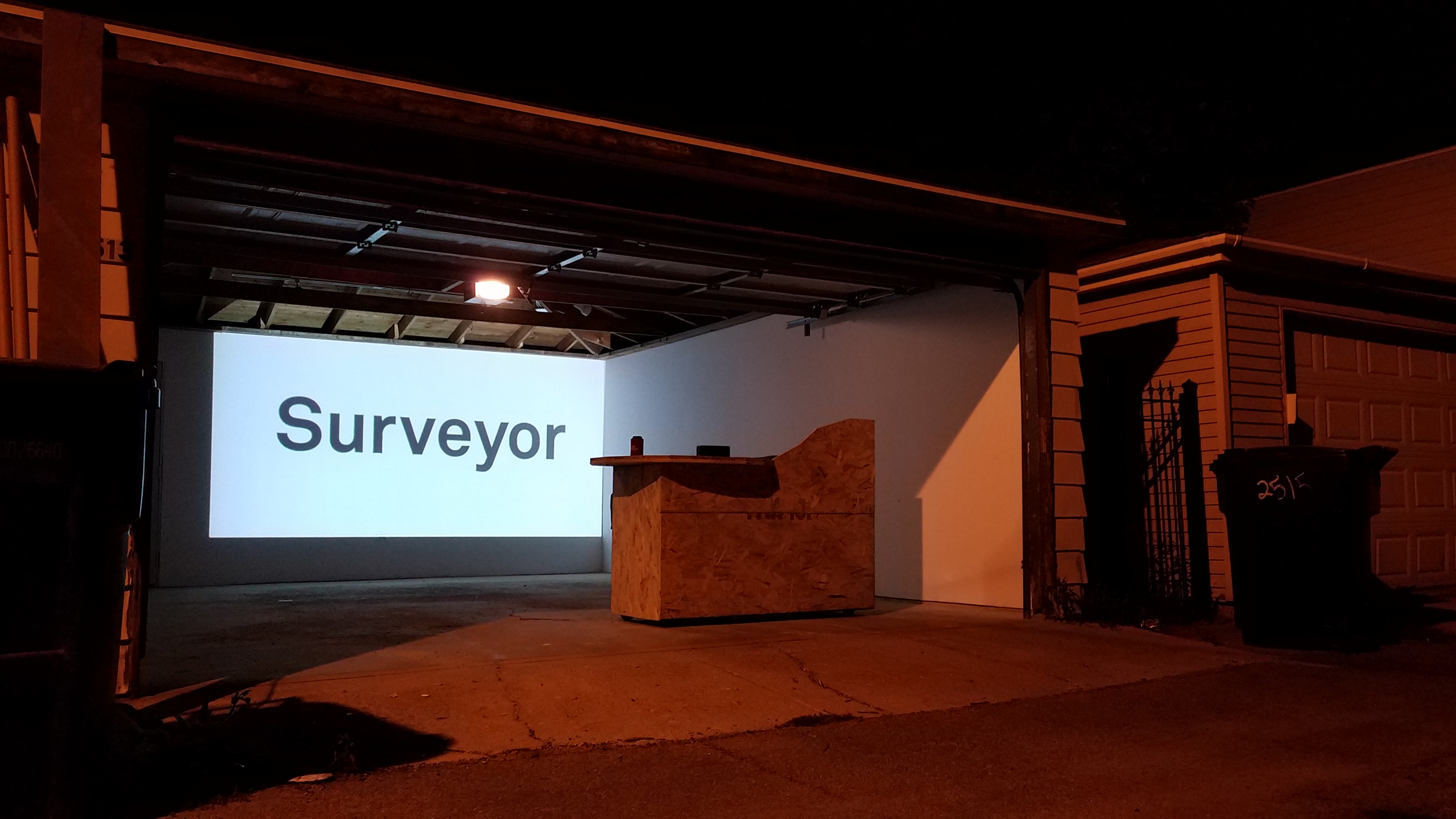 Surveyor signage projected on wall